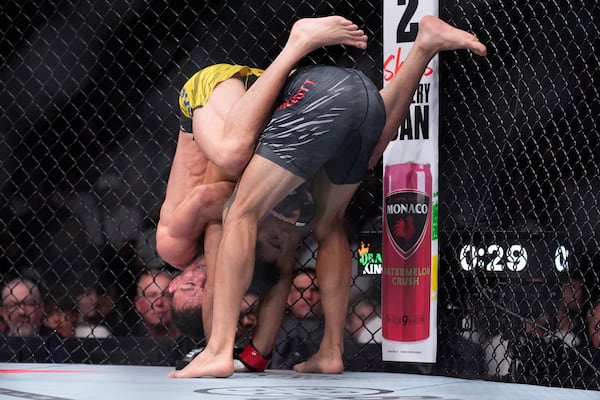 Payton Talbott, right, fights Felipe Lima in a bantamweight fight at UFC 317, Saturday, June 28, 2025, in Las Vegas. (AP Photo/John Locher)