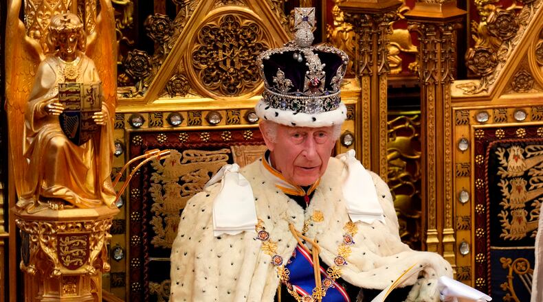 FILE - King Charles III looks up as he reads the King's Speech, during the State Opening of Parliament in the House of Lords in London on July 17, 2024. (AP Photo/Kirsty Wigglesworth, Pool, File)
