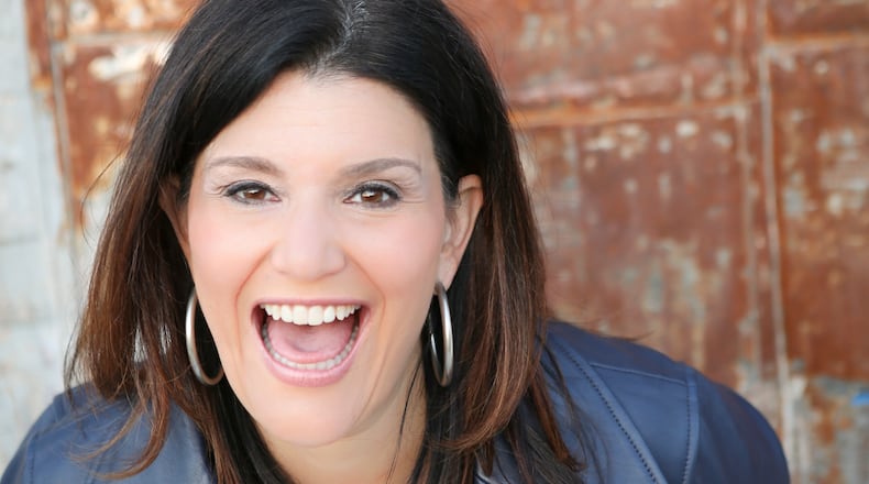 Mara Davis is heard every Friday on 90.1/WABE's "Morning Edition" talking about local music and now on NewsRadio 106.7 hosting "Atlanta Eats" Saturdays from 4 to 5 p.m. CREDIT: Catmax Photography