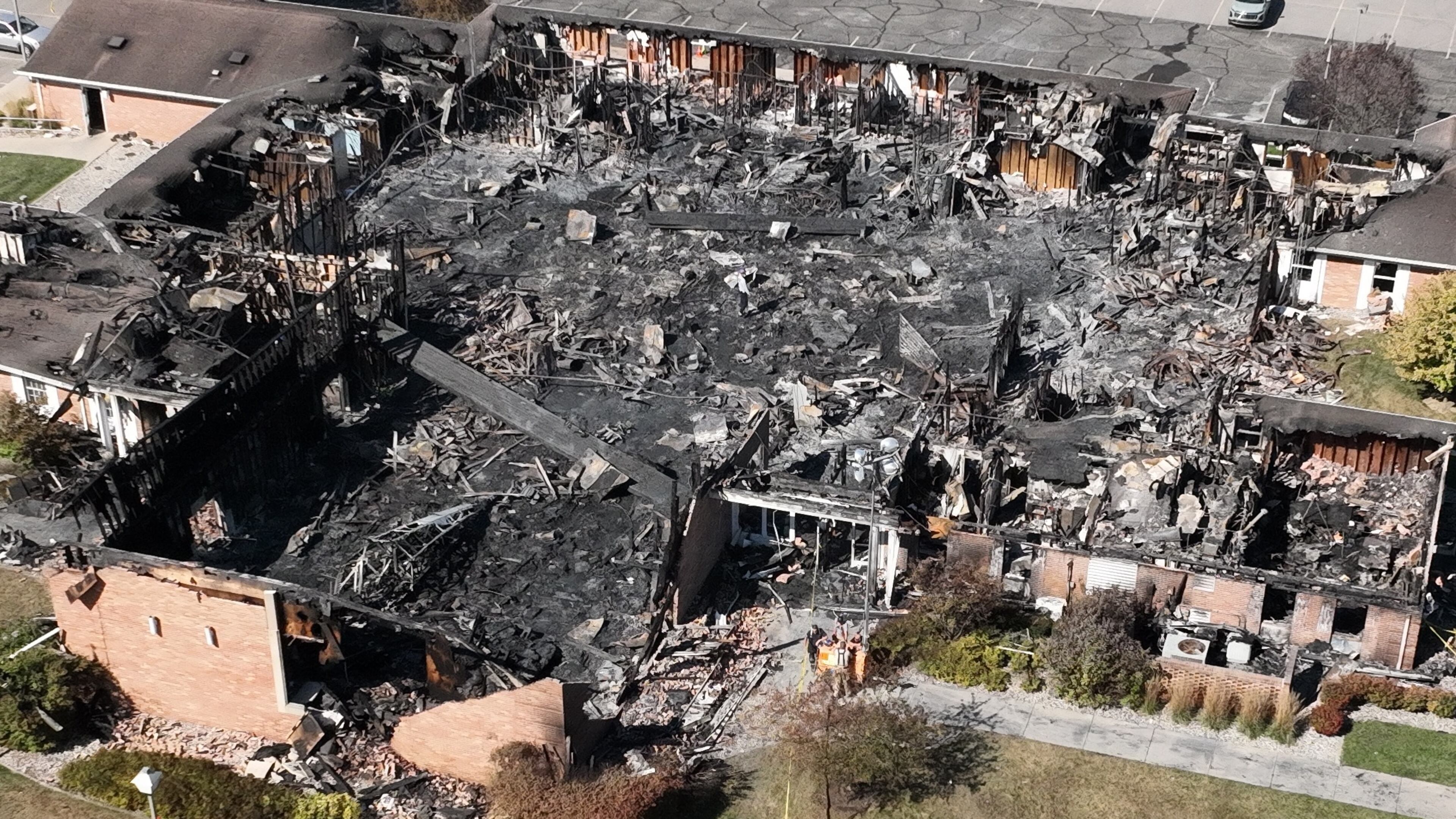 Little remained of The Church of Jesus Christ of Latter-day Saints chapel the day after a former Marine opened fire and set the building ablaze in Grand Blanc Township, Mich., Monday, Sept. 29, 2025. (AP Photo/Mark Vancleave)