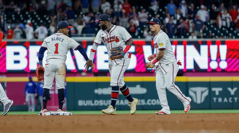 Braves players celebrate their win after beating the Chicago Cubs 7-0 at Truist Park on Tuesday, May 14, 2024, in Atlanta.
(Miguel Martinez/ AJC)