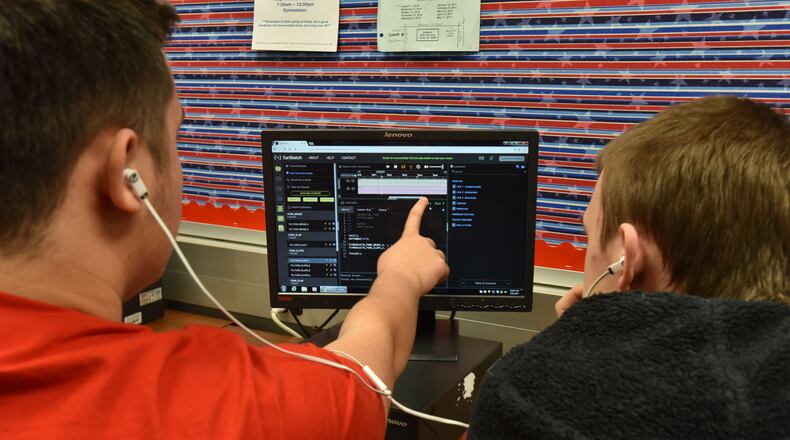 Two Berkmar High School students work during an AP Computer Science Principles class. AJC FILE PHOTO.