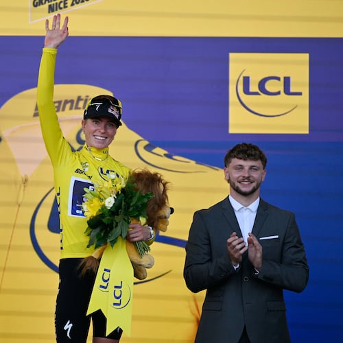 Netherlands' Demi Vollering celebrates on the podium after winning the Women's Tour de France cycling race (Tour de France Femmes) in Nice, France, Sunday, Aug. 9, 2026. (AP Photo/Philippe Magoni)