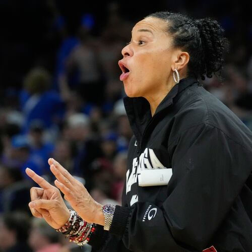 FILE - South Carolina head coach Dawn Staley motions towards the court against UCLA during the second half of the women's National Championship Final Four NCAA college basketball tournament game, April 5, 2026, in Phoenix. (AP Photo/Ross D. Franklin, File)