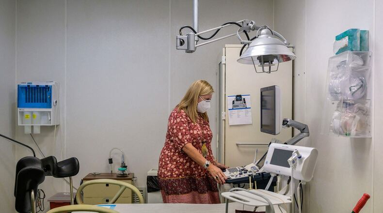 Julie Burkhart, co-owner of the Hope Clinic For Women, looks at an ultrasound machine inside an exam room in Granite City, Illinois in June 2022. (ANGELA WEISS/AFP/GETTY IMAGES)