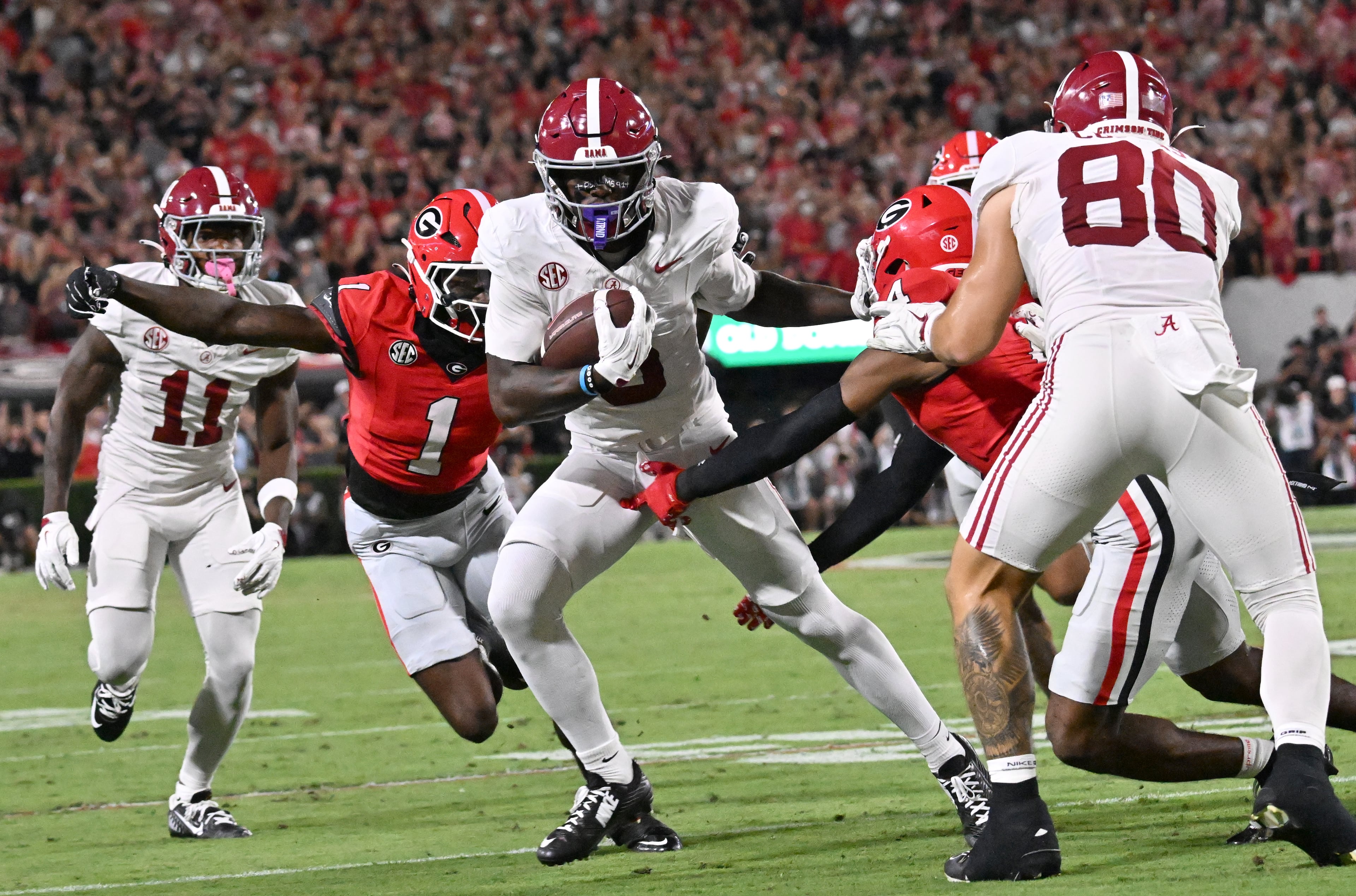 Alabama wide receiver Germie Bernard (5) runs for a first down during the first half in an NCAA football game at Sanford Stadium, Saturday, September 27, 2025, in Athens. (Hyosub Shin / AJC)