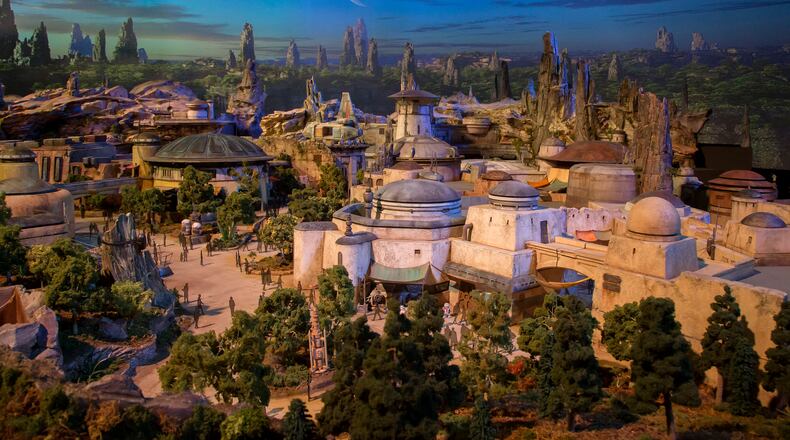 STAR WARS-THEMED LAND MODEL AT D23 EXPO --The epic, fully detailed model of the Star Wars-themed lands under development at Disneyland park in Anaheim, Calif. and Disney Hollywood Studios in Orlando, Fla. remains on display in Walt Disney Parks and Resorts 'A Galaxy of Stories' pavilion throughout D23 Expo at the Anaheim Convention Center. The stunning exhibition gives D23 Expo guests an up-close look at what's to come on this never-before seen planet. (Joshua Sudock/Disney Parks)
