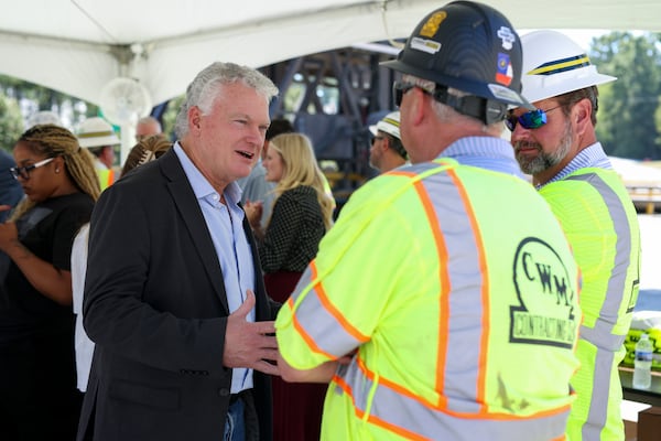 U.S. Rep. Mike Collins, seen here touring an asphalt plant in Norcross last month. (Jason Getz/AJC)