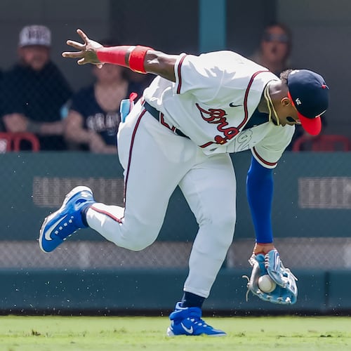 Atlanta Braves right fielder Ronald Acuña Jr. catches a fly ball hit by Colorado Rockies' Brett Sullivan during the second inning of a baseball game, Sunday, Aug. 30, 2026, in Atlanta. (AP Photo/Erik S. Lesser)