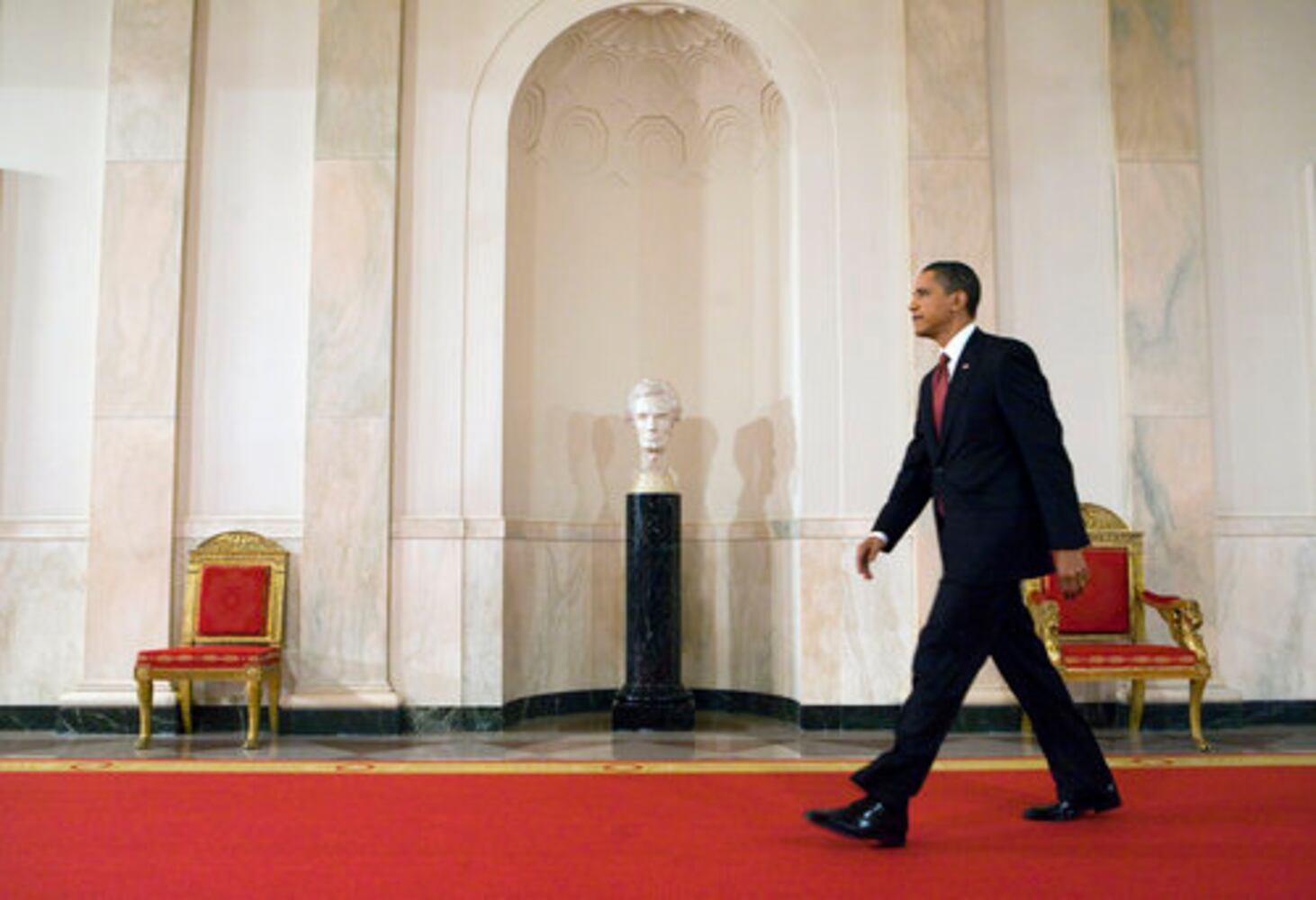 Obama defends plans for economic recovery