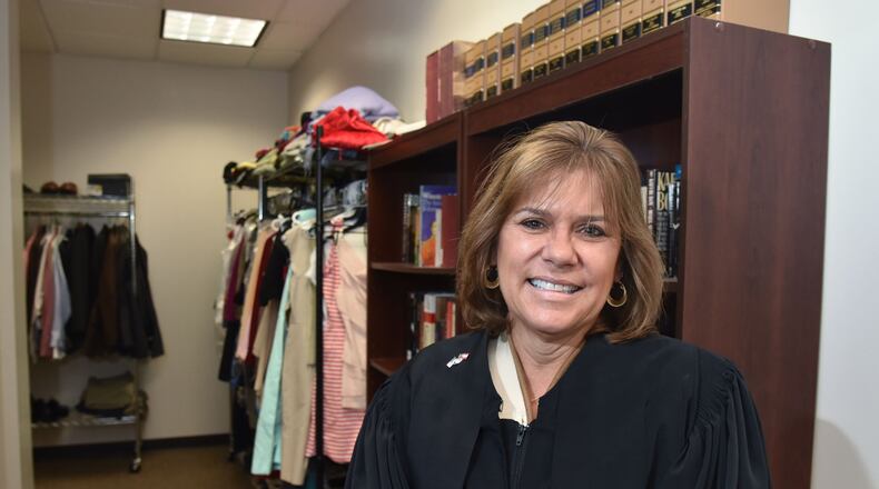 November 20, 2018 Atlanta - Portrait of Superior Court Judge Shawn LaGrua in a room, where there are books and clothing for those who are going through the My Journey Matters program, at Fulton County Superior Court in Atlanta on Tuesday, November 20, 2018. Fulton County Judge Shawn LaGrua doesn't take the easy cases for her My Journey Matters program. HYOSUB SHIN / HSHIN@AJC.COM