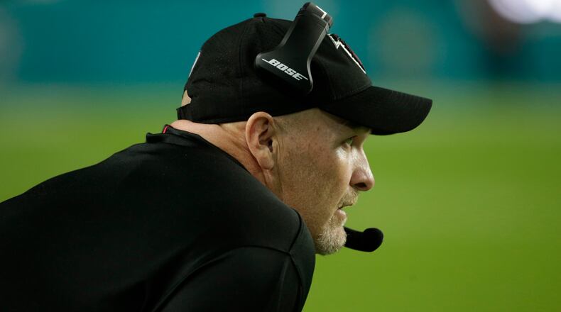 Atlanta Falcons head coach Dan Quinn watches the game, during the second half of an NFL preseason football game against the Miami Dolphins, Thursday, Aug. 10, 2017, in Miami Gardens, Fla. (AP Photo/Lynne Sladky)