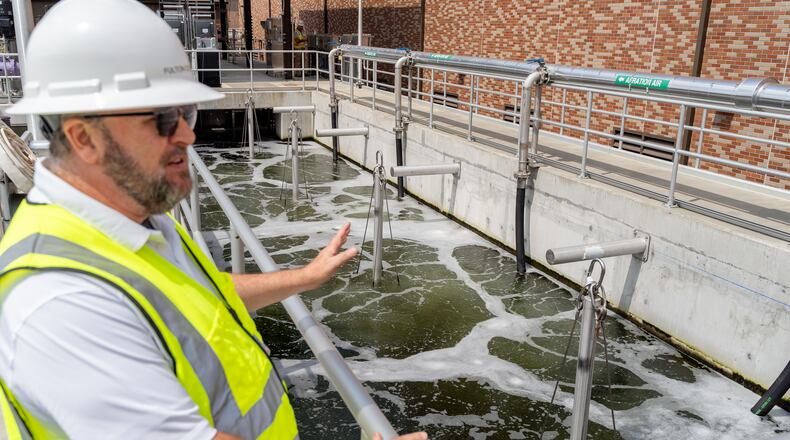 Fulton County Director of Public Works David Clark speaks about an aerated water tank. Fulton County officials tour the new water reclamation facility built on the grouds of the existing Big Creek Wastewater Treament center. Thursday, August 22, 2024 (Ben Hendren for the Atlanta Journal-Constitution)