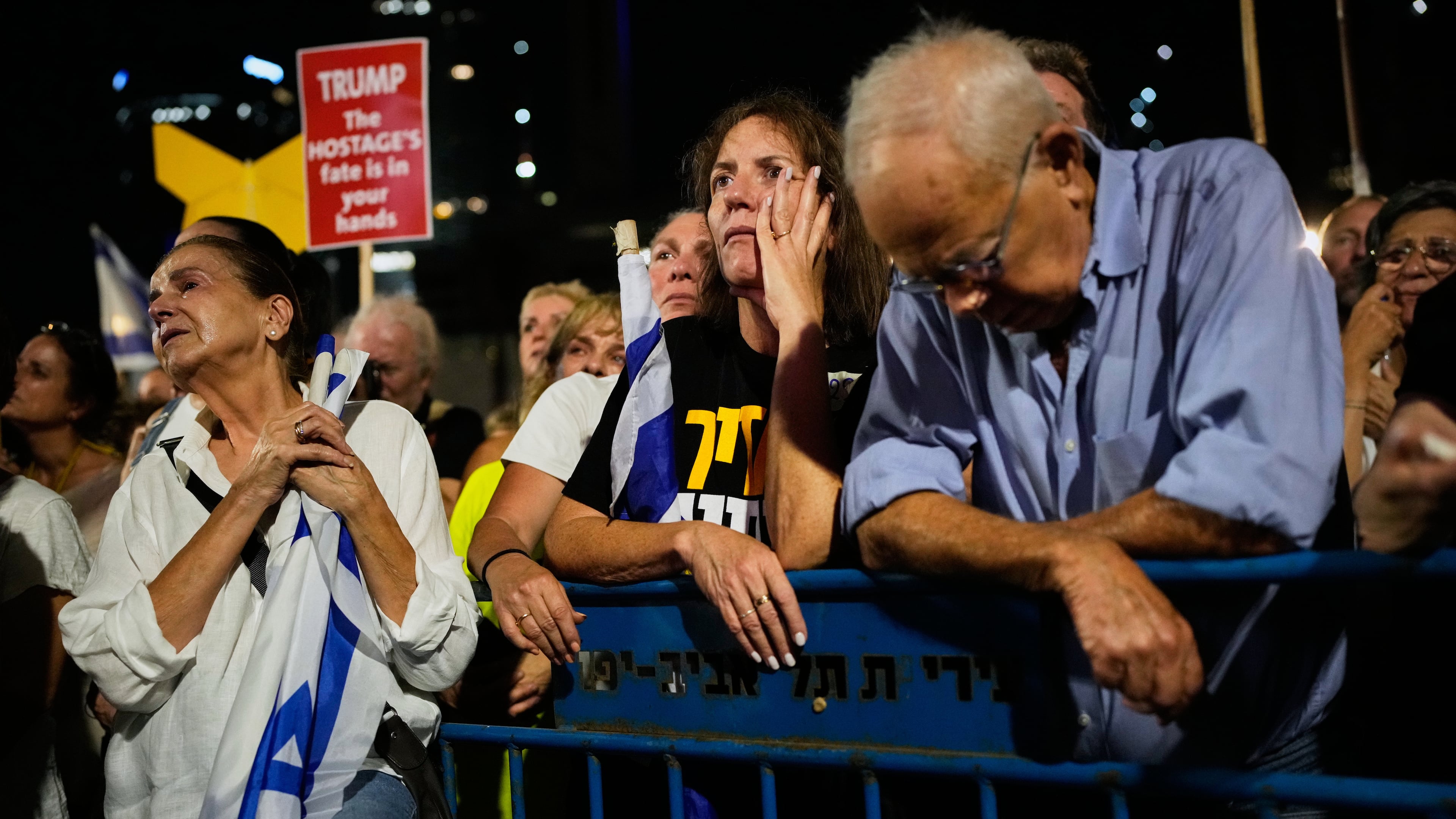 People attend a rally calling for the release of all hostages held by Hamas in the Gaza Strip and urges a ceasefire, in Tel Aviv, Israel, Saturday, Oct. 4, 2025. ahead of the second anniversary of the Israel-Hamas war. (AP Photo/Ohad Zwigenberg)