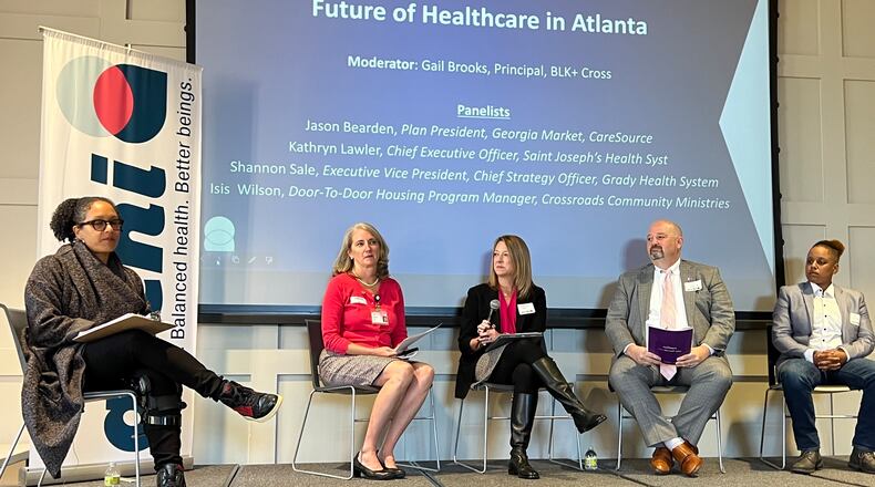The Atlanta Regional Collaborative for Health Improvement hosted an event Friday with health care leaders discussing the future of health care in Atlanta. From left to right is moderator Gail Brooks, Kathryn Lawler, Saint Joseph’s Health System's CEO; Shannon Sale, executive vice president of the Grady Health System; Jason Bearden of CareSource and community health worker Isis Wilson. (Staff photo by Donovan Thomas)