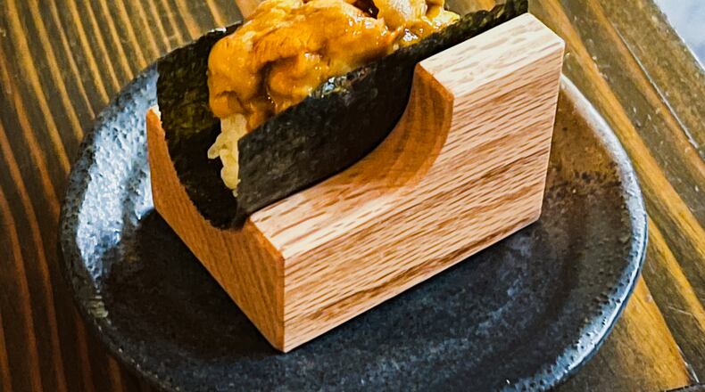 The Hokkaido uni hand roll at Cuddlefish, highlighting the sumptuous, fresh sea urchin.