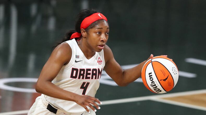 Aari McDonald scored 18 for the Dream. AJC file photo