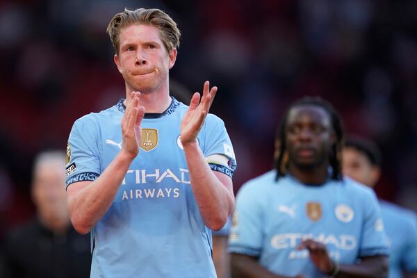 Manchester City's Kevin De Bruyne leaves the pitch after the English Premier League soccer match between Manchester City and Manchester United in Manchester, England, Sunday, April 6, 2025. (AP Photo/Dave Thompson)