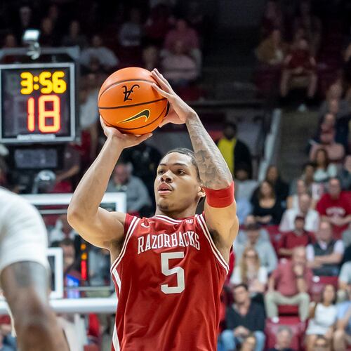 Arkansas guard Darius Acuff Jr. (5) shoots during the first half of an NCAA college basketball game against Alabama Wednesday, Feb. 18, 2026, in Tuscaloosa, Ala. (AP Photo/Vasha Hunt)