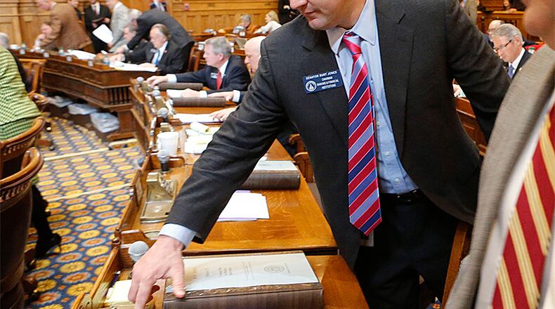 March 20, 2015 - Atlanta - Senators, including Senator Burt Jones, vote on the budget. The Senate gave its blessing to a state budget for the upcoming year, with millions for bridge and transit projects, nursing homes and doctors, big raises for judges and smaller ones for state employees. The spending plan includes several items aimed to respond to complaints that minority-owned businesses are virtually shut out of DOT contracts. BOB ANDRES / BANDRES@AJC.COM