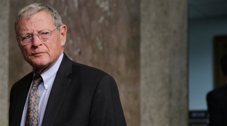 WASHINGTON, DC - MARCH 17: Senate Armed Services Committee member Sen. James Inhofe (R-OK) arrives for hearing about the Pentagon budget in the Dirksen Senate Office Building on Capitol Hill March 17, 2016 in Washington, DC. Although Congress controls the Department of Defense's budget, members of the committee were critical of leadership's decisions on readiness spending and cuts to other programs. (Photo by Chip Somodevilla/Getty Images)