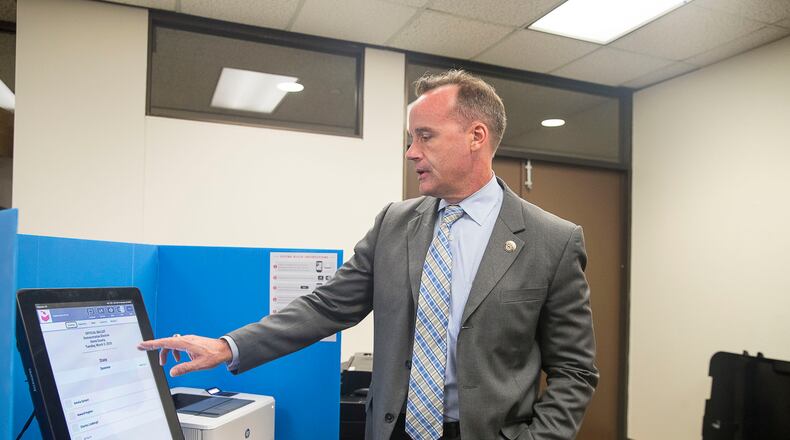 09/16/2019 -- Atlanta, Georgia -- Chris Harvey, director of elections division for the Georgia Secretary of State, shows off the new Georgia voting machines during a demonstration at the James H. "Sloppy" Floyd building in Atlanta, Monday, September 16, 2019. (Alyssa Pointer/alyssa.pointer@ajc.com)