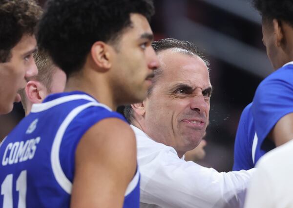 Drake head coach Ben McCollum yells at his players during a timeout against Texas Tech in the second round of the NCAA college basketball tournament, Saturday, March 22, 2025, in Wichita, Kan. (AP Photo/Travis Heying)