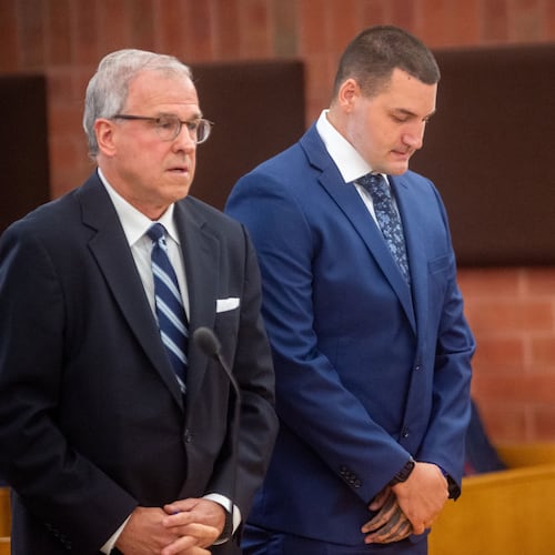 Former Hartford police officer Joseph Magnanom, right, stands with his attorney, Patrick Tomasiewicz, during his arraignment at Hartford Superior Court in Hartford, Conn., on Friday, June 5, 2026. (Aaron Flaum/Hartford Courant via AP, Pool)