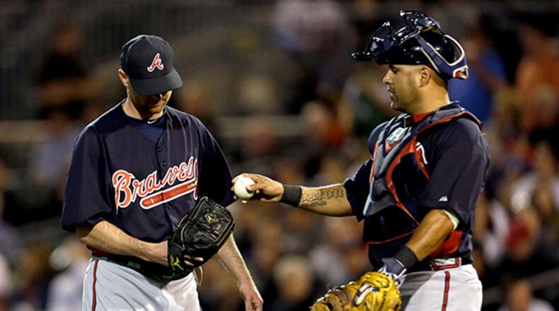 The Braves are cautiously optimistic about their lefty setup man Jonny Venters (left) ailing elbow.