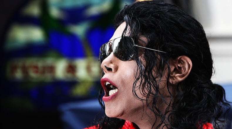 LONDON - AUGUST 28: Michael Jackson impersonator 'Navi' poses for a photograph as he promotes the launch of the new 'King of Pop' Album on August 28, 2008. 'Navi' is portraying Jackson in Lifetime's new biopic "Michael Jackson: Searching for Neverland."