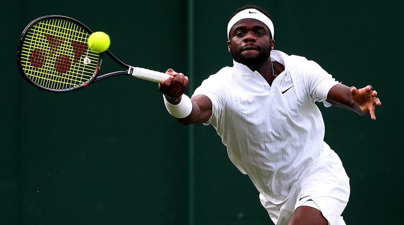 Frances Tiafoe of The United States plays a forehand in his Men's Singles first round match against Fabio Fognini of Italy during Day two of The Championships - Wimbledon 2019 at All England Lawn Tennis and Croquet Club on July 02, 2019 in London, England. (Photo by Laurence Griffiths/Getty Images)