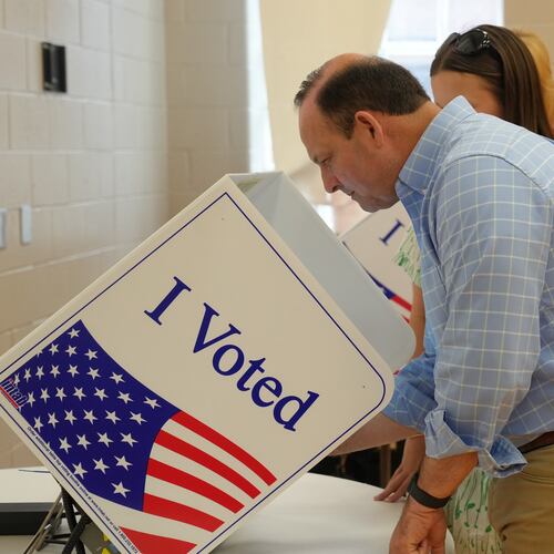 As his teenage daughter looks on, South Carolina Attorney General Alan Wilson, seeking to become the state's next governor, casts his ballot in the Republican primary runoff elections on Tuesday, June 23, 2026, in Lexington, S.C. (AP Photo/Meg Kinnard)