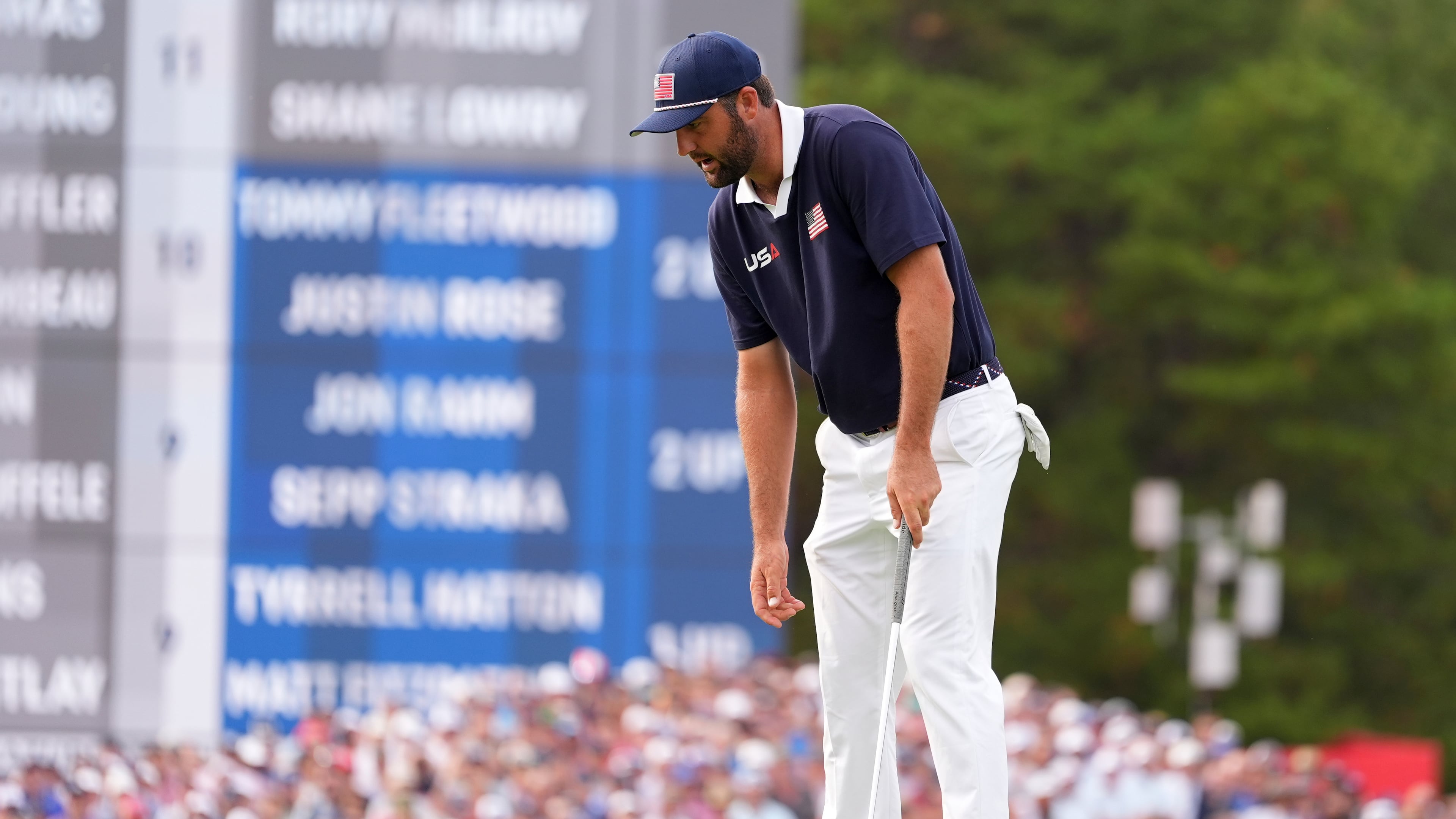 United States' Scottie Scheffler reacts after missing a putt on the 11th hole at Bethpage Black golf course during the Ryder Cup golf tournament, Saturday, Sept. 27, 2025, in Farmingdale, N.Y. (AP Photo/Lindsey Wasson)