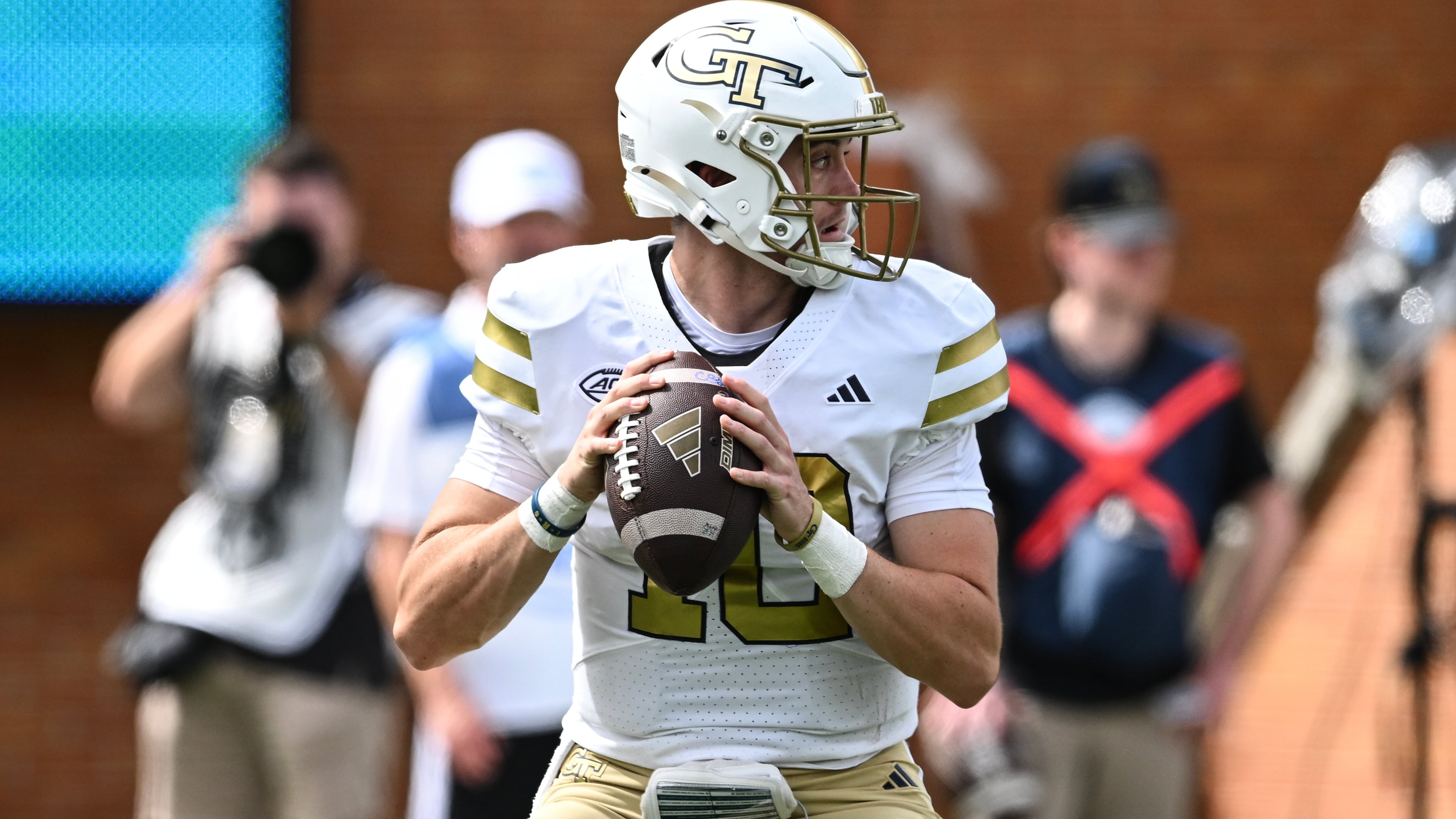 Georgia Tech quarterback Haynes King (10) drops back to pass during the first half of an NCAA college football game against Wake Forest, Saturday, Sept. 27, 2025, in Winston-Salem, N.C. (AP Photo/Matt Kelley)