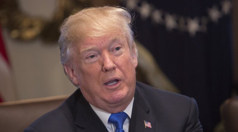 U.S. President Donald Trump, shown here in December speaking to the media during a Cabinet meeting at the White House. His administration this week finalized a rule easing access to “association health plans.” The plans are exempted from some Obamacare rules and offer skimpier coverage for more affordable premiums. (Photo by Chris Kleponis-Pool/Getty Images)