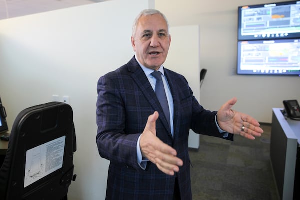 FILE - Union Pacific CEO Jim Vena talks in front of a locomotive simulator used to train engineers at the company's headquarters in Omaha, Neb., Dec. 15, 2023. (AP Photo/Josh Funk, File)