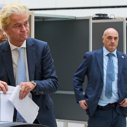Far-right anti Islam lawmaker Geert Wilders, second left, casts his vote at a polling station during general elections in The Hague, Netherlands, Wednesday, Oct. 29, 2025. (AP Photo/Peter Dejong)