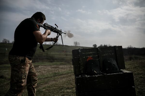 In this provided by Ukraine's 24th Mechanized Brigade press service, a serviceman of 3rd mechanized battalion, practices on the training ground at an undisclosed location in the east of Ukraine, Thursday, March 27, 2025. (Oleg Petrasiuk/Ukraine's 24th Mechanized Brigade via AP)