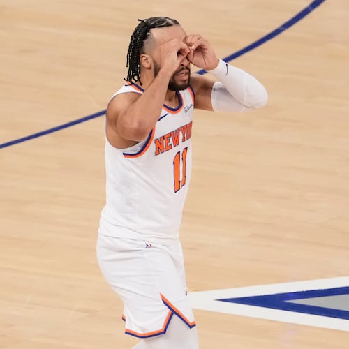New York Knicks guard Jalen Brunson (11) reacts after scoring a three point goal during the second half of an NBA basketball game against Cleveland Cavaliers, Thursday, Dec. 25, 2025, in New York. (AP Photo/Yuki Iwamura)