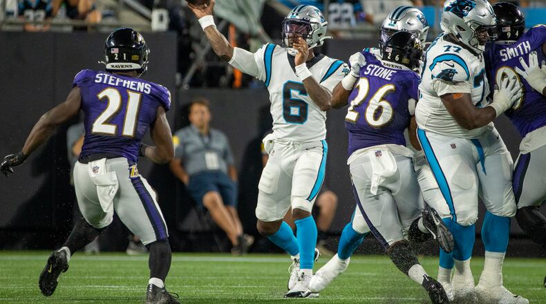 Carolina Panthers quarterback P.J. Walker (6) throws the ball against the Baltimore Ravens during the second half of a preseason game at Bank of America Stadium on Saturday, Aug. 21, 2021, in Charlotte, North Carolina. (Chris Keane/Getty Images/TNS)