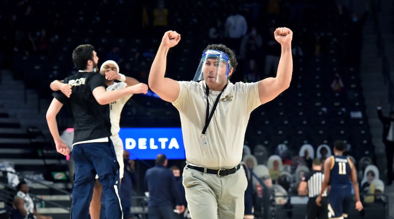 Georgia Tech basketball coach Josh Pastner celebrates their victory over Notre Dame Saturday, Feb. 6, 2021, at McCamish Pavilion in Atlanta. Tech won 82-80. (Hyosub Shin / Hyosub.Shin@ajc.com)