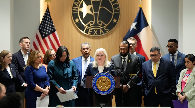 U.S. Rep. Sylvia Garcia, D-Texas, center, leads a news conference with other members of Congress after an oversight forum on Friday, July 24, 2026, in Houston, about the death of Lorenzo Salgado Araujo, who was fatally shot by an ICE officer. (AP Photo/Ashley Landis)