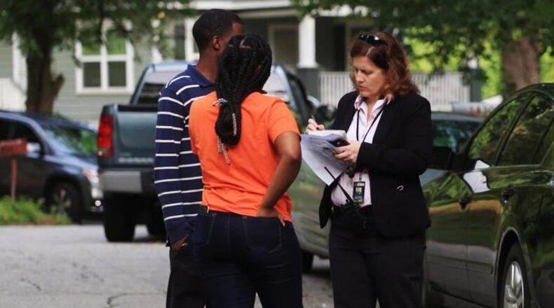 Detective Lisa Bender of Atlanta Police Department interviews people on Friday, June 26, 2020, on Meadow Park Drive in Atlanta, after an 80-year-old man was found shot dead in a house on the street earlier that morning . Police discovered the victim, identified by family members as Clarence Knox, when asked to do a welfare check at the home. Investigators do not believe Knox was the intended target of the gunfire, Atlanta police spokesman Officer Steve Avery told Channel 2 Action News. CHRISTINA MATACOTTA FOR THE ATLANTA JOURNAL-CONSTITUTION.