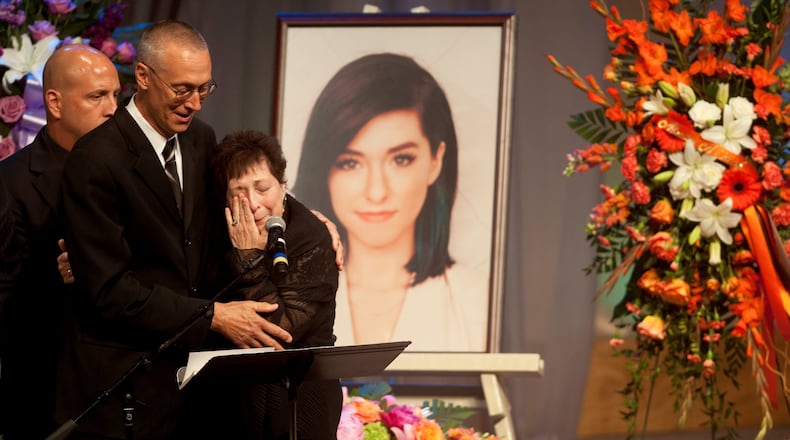 MEDFORD, NJ - JUNE 17: Christina Grimmie's parents Bud Grimmie and Tina Grimmie speak at her memorial service on June 17, 2016 in Medford, New Jersey. Christina Grimmie died from a fatal injury after being shot by a fan after a concert in Orlando, Florida on June 10, 2016. (Photo by Chris Lachell - Pool/Getty Images)