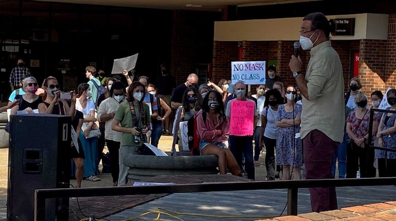 ATHENS, Sept. 14, 2021 - University of Georgia professor Joseph Fu speaks at a rally on campus on Sept. 14, 2021 demanding mask mandates and other measures to help mitigate the spread of COVID-19 at the university. Fu requires students to wear masks in his classes, which violates University System of Georgia policy. ERIC STIRGUS/ERIC.STIRGUS@AJC.COM.