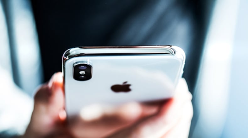 Government agencies and consumer advocates in the radio industry are continuing to apply pressure on Apple to activate the FM chip in its iPhones. (Dreamstime/TNS)