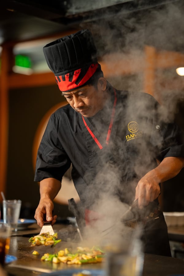 A hibachi chef is wreathed in steam at Nakato. (Courtesy of Nakato)