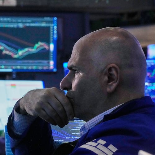 Specialist Philip Finale works on the floor of the New York Stock Exchange, Friday, June 26, 2026. (AP Photo/Richard Drew)