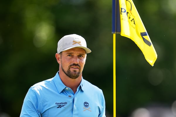 Bryson DeChambeau walks off the green on the second hole during a practice round for the PGA Championship golf tournament at the Quail Hollow Club, Tuesday, May 13, 2025, in Charlotte, N.C. (AP Photo/George Walker IV)