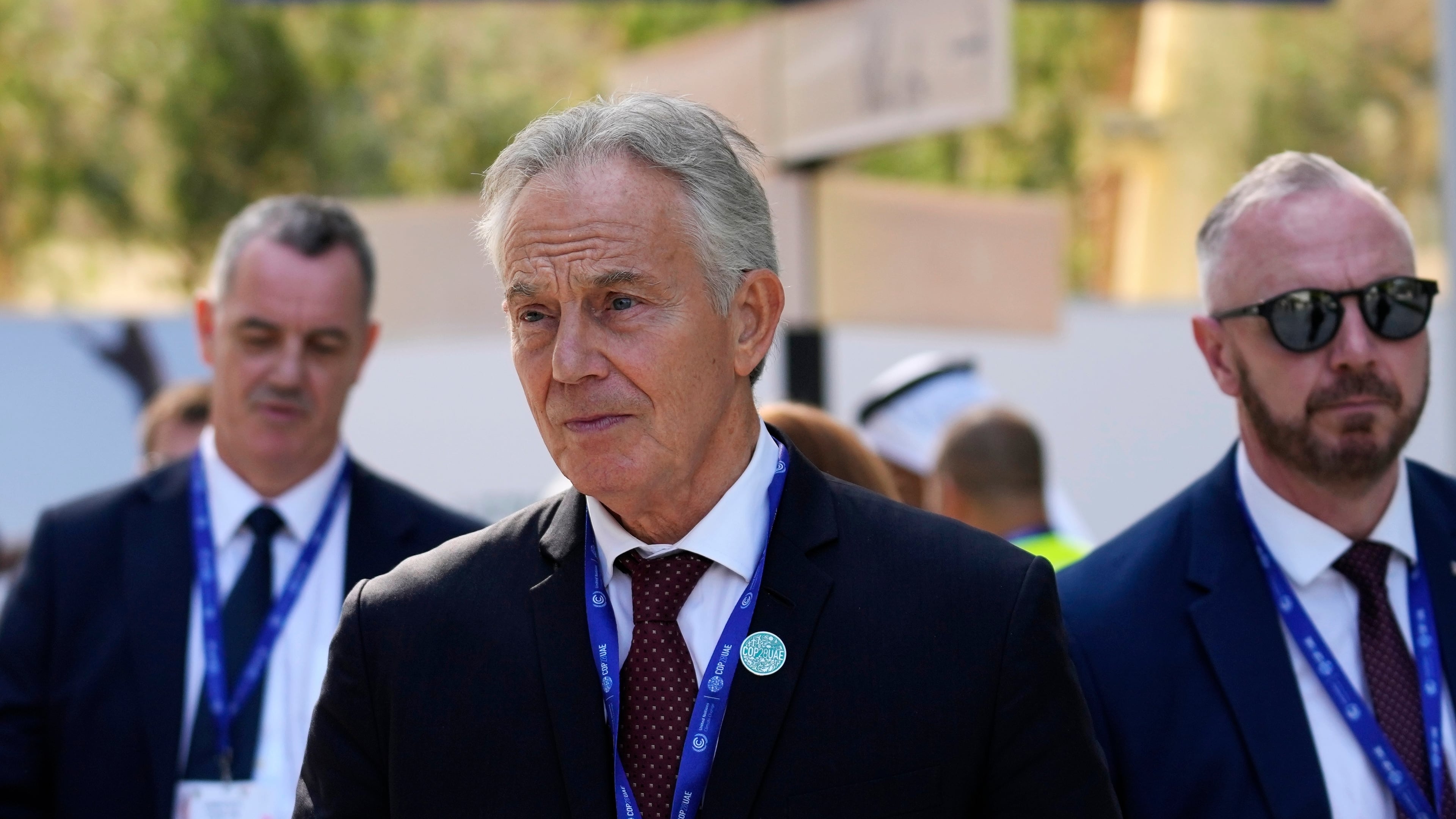 FILE - Britain's former Prime Minister Tony Blair walks through the COP28 U.N. Climate Summit, Sunday, Dec. 3, 2023, in Dubai, United Arab Emirates. (AP Photo/Rafiq Maqbool, file)